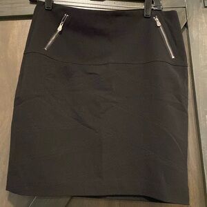 Black mini skirt by Nicole Miller. Size 10.